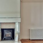 Smaller Living Spaces - Black Fireplace Inside Wall