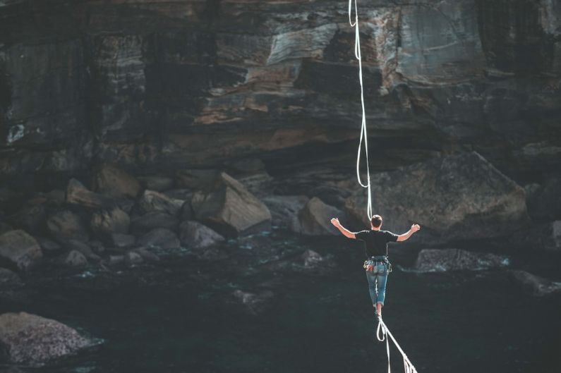 Risk - man on rope