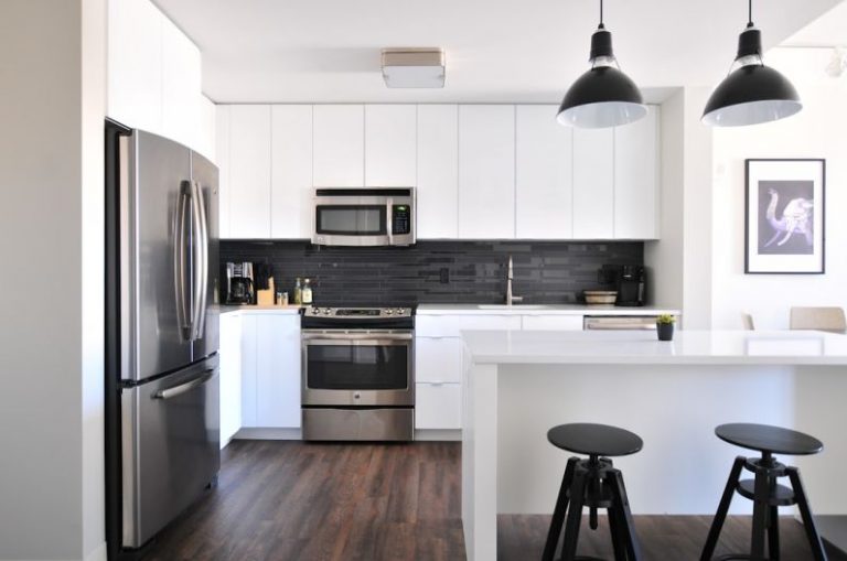 Residential Or Commercial Real Estate - gray steel 3-door refrigerator near modular kitchen