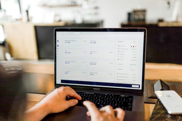 Financial Metrics - person using MacBook pro