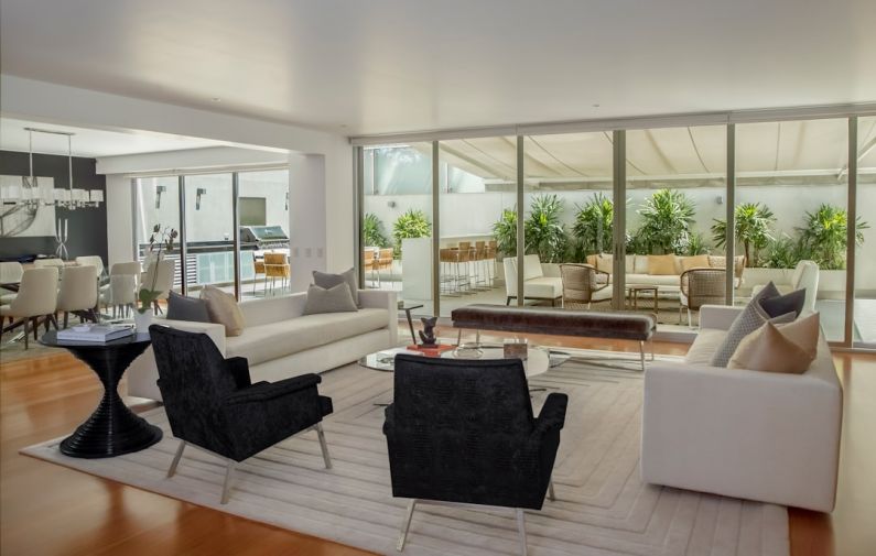 Australian Property Market - two black suede armchairs during daytime