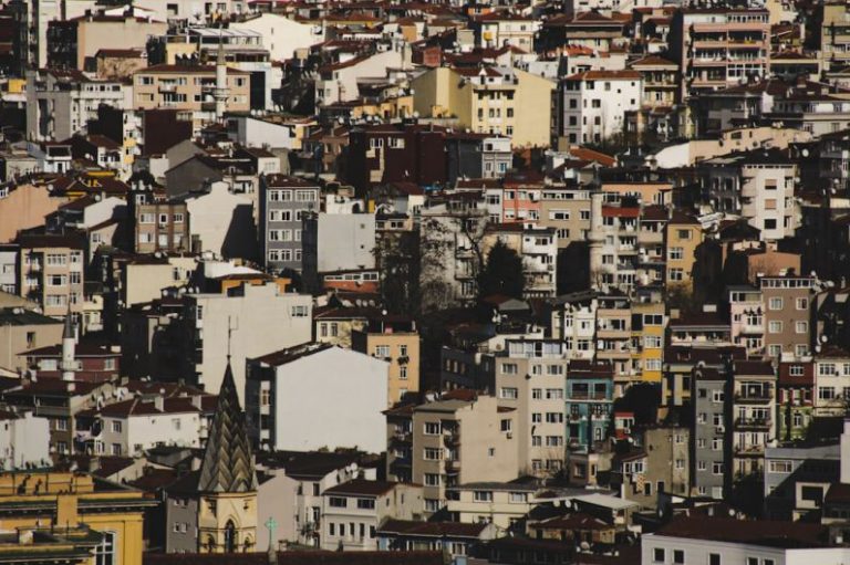 Urbanization - aerial view of city buildings during daytime